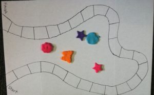 The board game design traced in sharpie