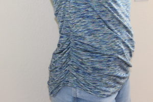 Dolman shirt with ruched sides.