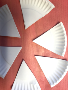 Cut a paper plate into 6 pieces.