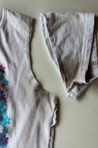 First cut off the sleeves, upcycle