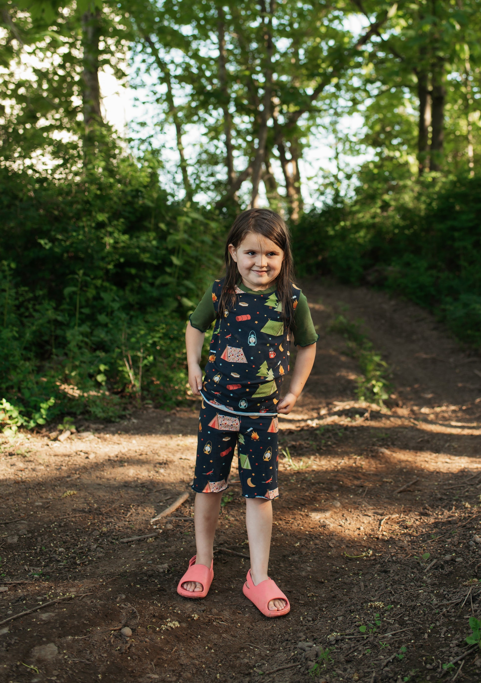 Girl wearing camping cutie with olive green shortie pajamas