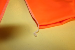 Tuck in serger tail